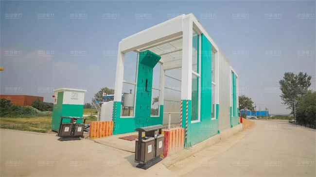 洗车机为骨料运输车降尘